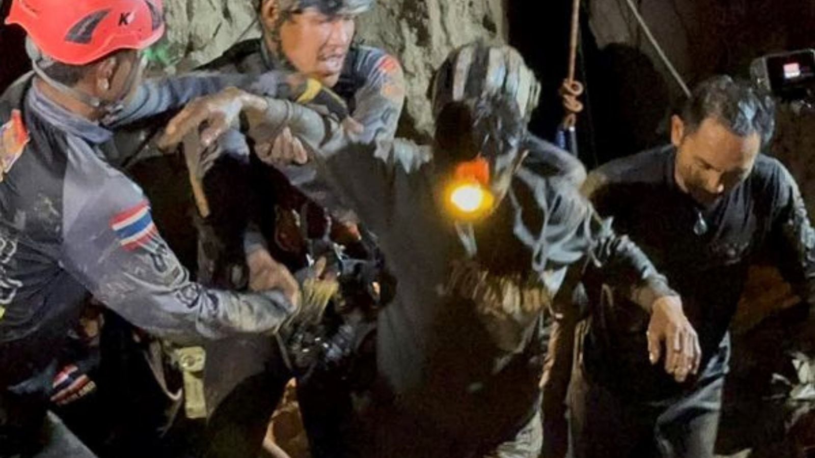 Rescuers pull first trapped person from flooded Laos cave