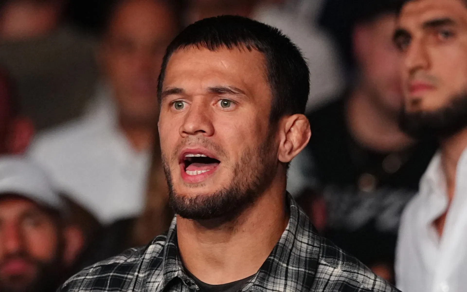 "They are brothers" - Song Yadong defends Usman Nurmagomedov jumping the cage after brother's brutal KO loss